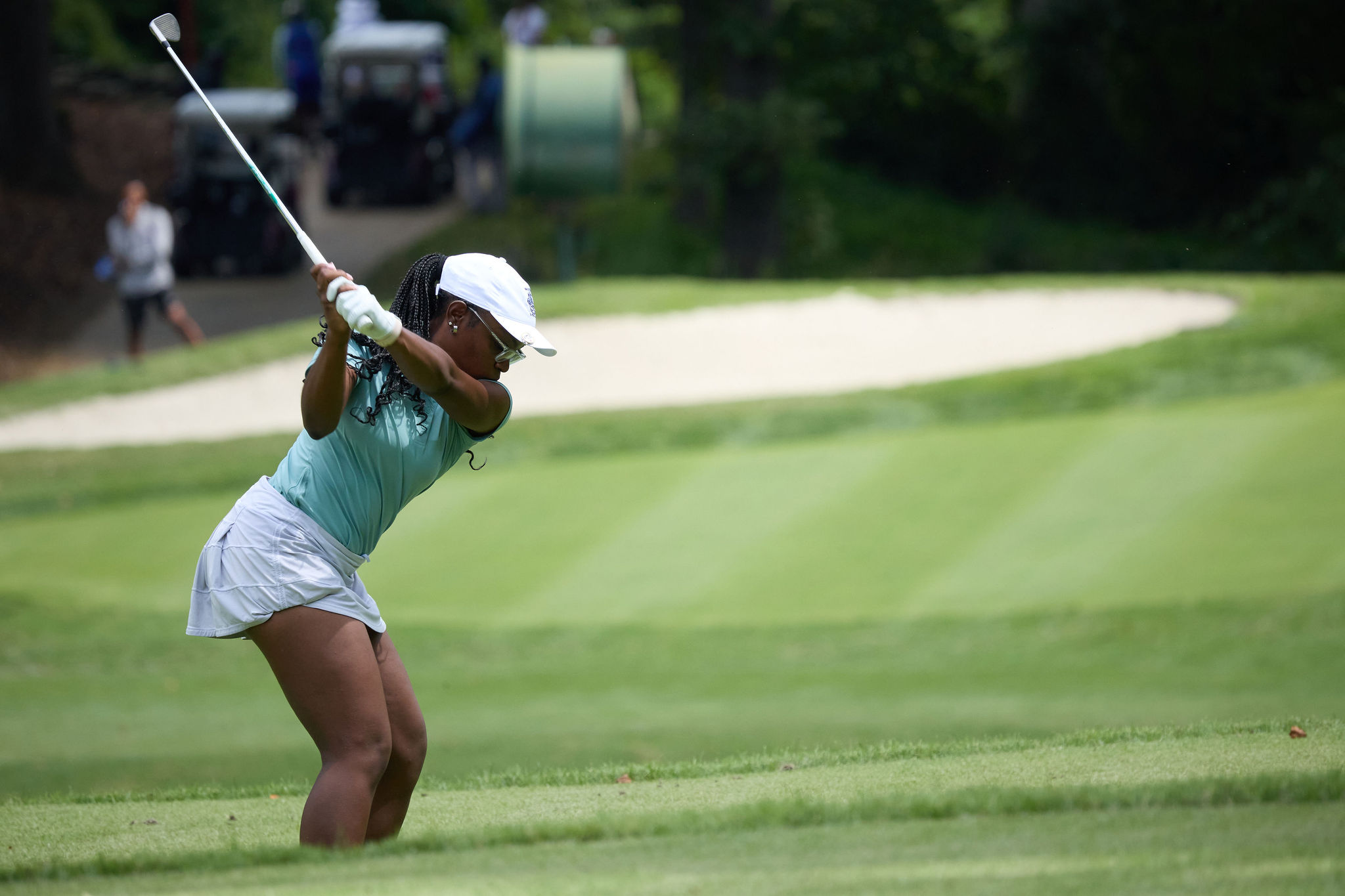Sapphire golfer preparing to strike a shot during tournament play